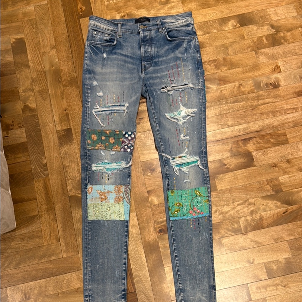 AMIRI Blue Skinny Jeans with Distressed Pixel Design